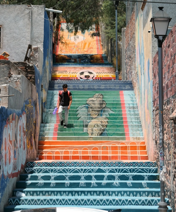 Mural-covered staircase in a Querétaro neighborhood